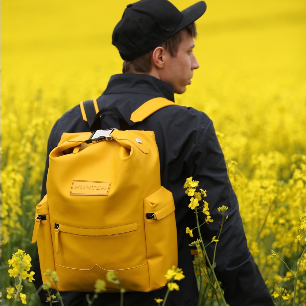 The original Top clip Hunter Rubberized Leather Backpack in yellow